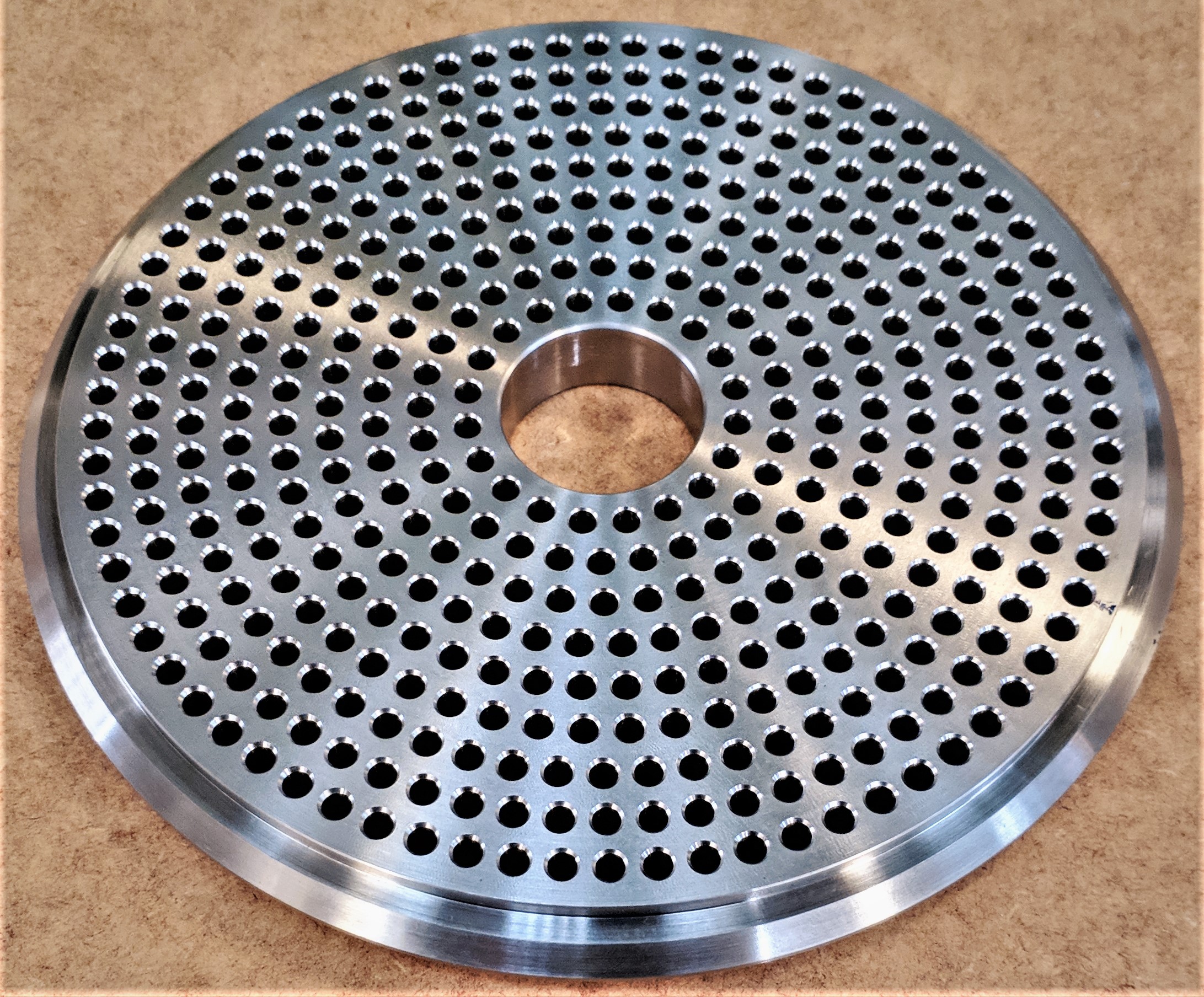 Disco Forjado Furado Inox AISI 310 (perforated forged disk inox 310)